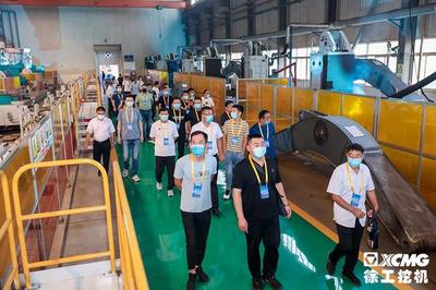 【记者手记】从零到二十万 一场庆典背后的中国制造攀登之路